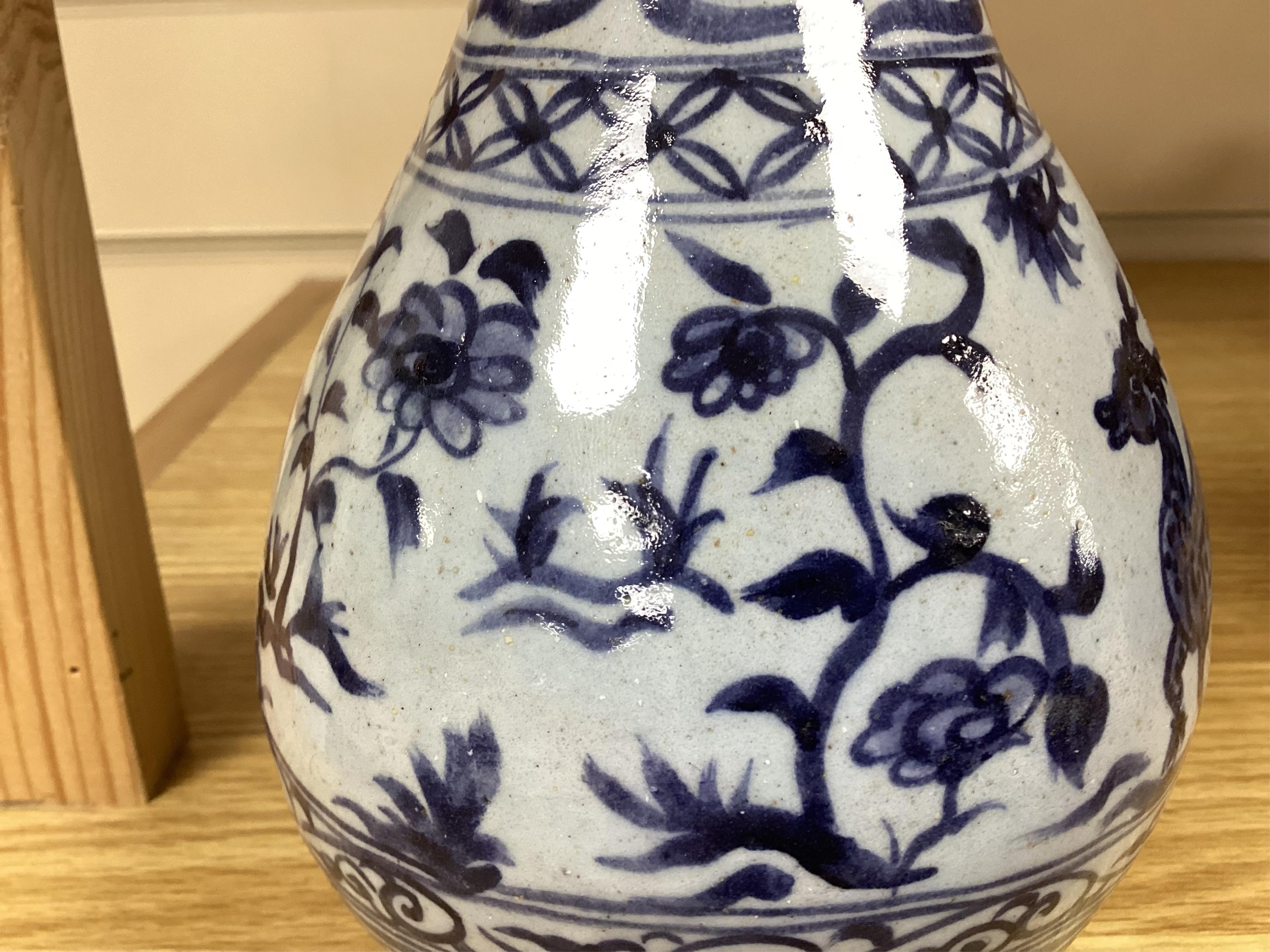 A group Oriental ceramics including Chinese famille rose plates, various tea bowls, a teapot, vases etc., tallest blue and white vase 21.5cm high (28). Condition - fair